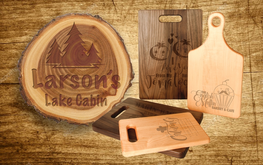 Wood cutting boards and tree trunk slab with engraving
