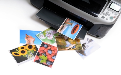 Color photos coming out of a printer